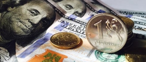 ЦБ установил курсы доллара и евро на 21 февраля: эксперты считают, что у рубля вновь появился шанс взять отметку в 55 за доллар