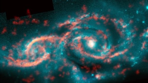 Телескоп ALMA сделал снимок космической "цунами", возникшей при столкновении двух галактик